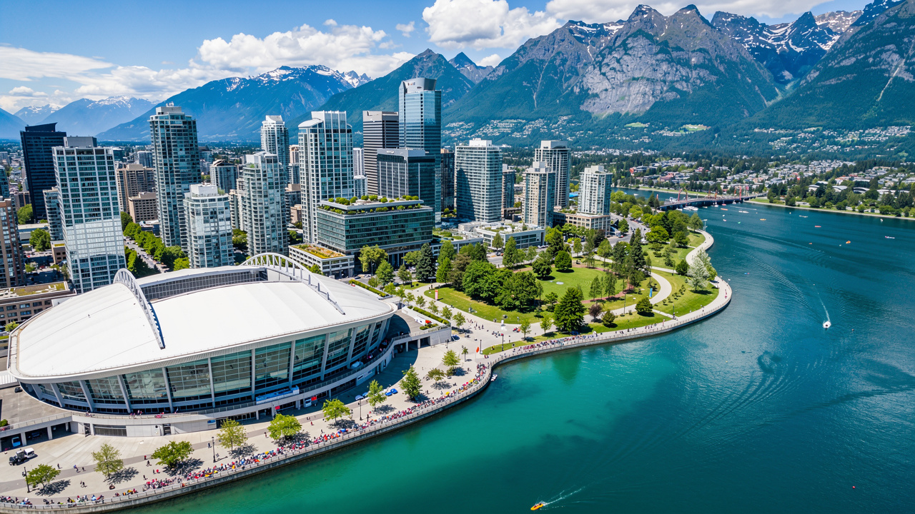 Aerial view of Vancouver with BC Place and mountain backdrop